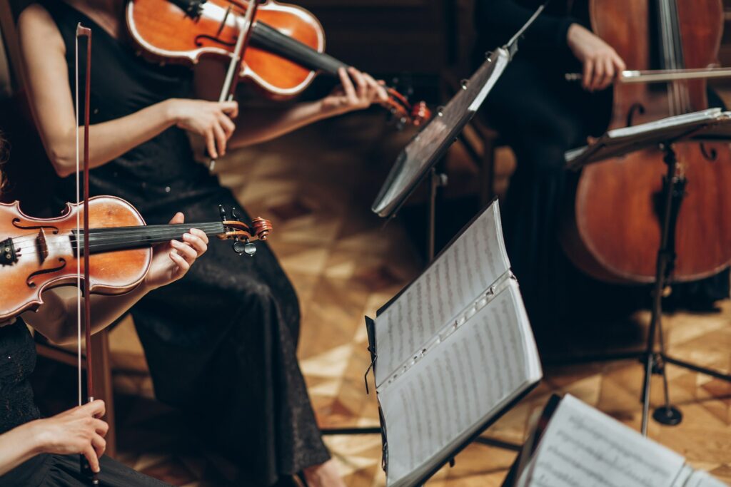 Elegant string quartet playing in luxury room