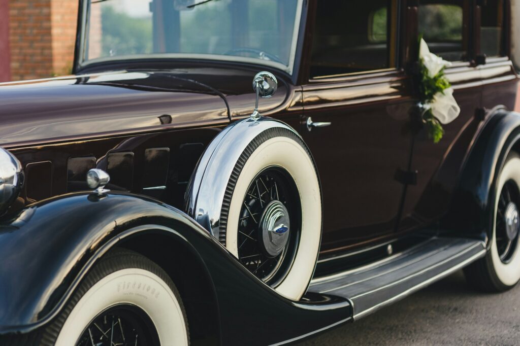 Old luxury Lincoln car used by bridal couples on their wedding day.