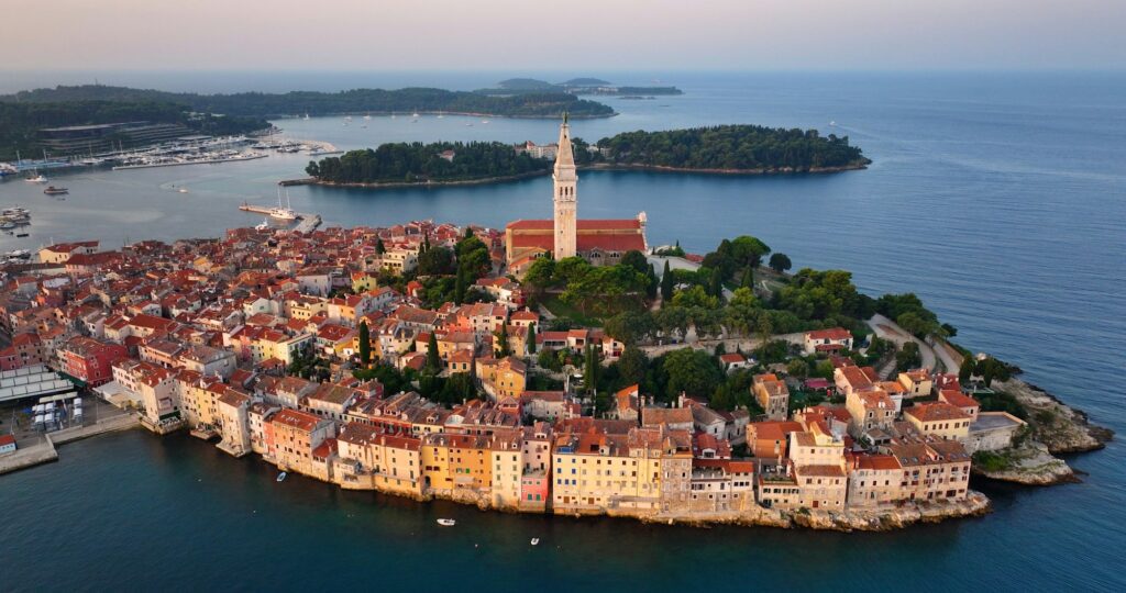 Sunrise aerial view of Rovinj, ancient Croatian city at the sea. Istria, Croatia