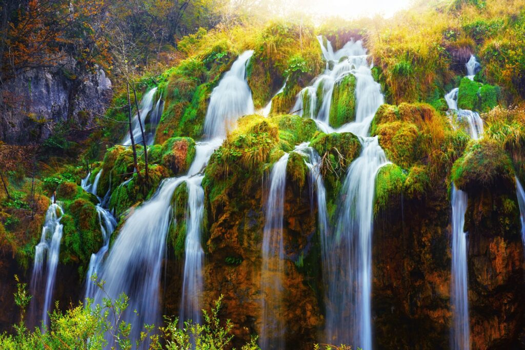 Water flows of amazing waterfall in Plitvice lakes shot by wedding photographer